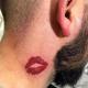What does tattoo kiss mean?